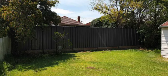 A black colorbond fence in Maitland